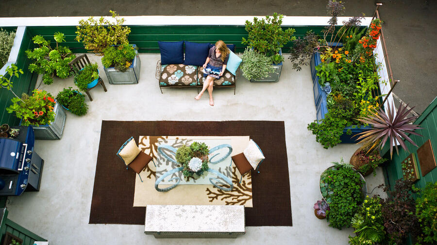 Backyard patio concrete color stained and repaired.