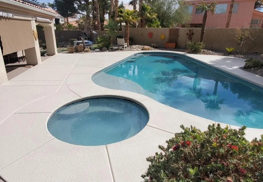 Untitled Backyard patio concrete color stained and repaired.
